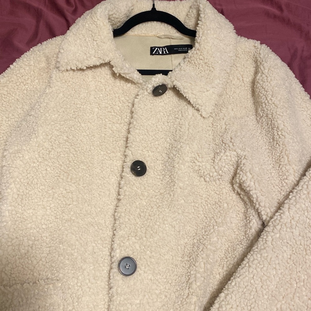 Ivory color between white and cream